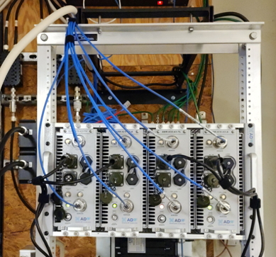Headend rack with cellular repeater amplifiers all wired up and running